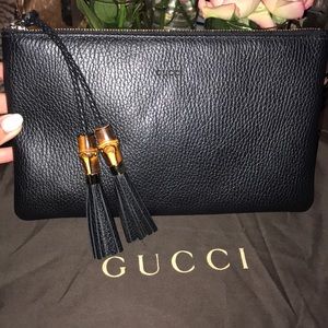 Authentic Brand new Gucci black tassel clutch